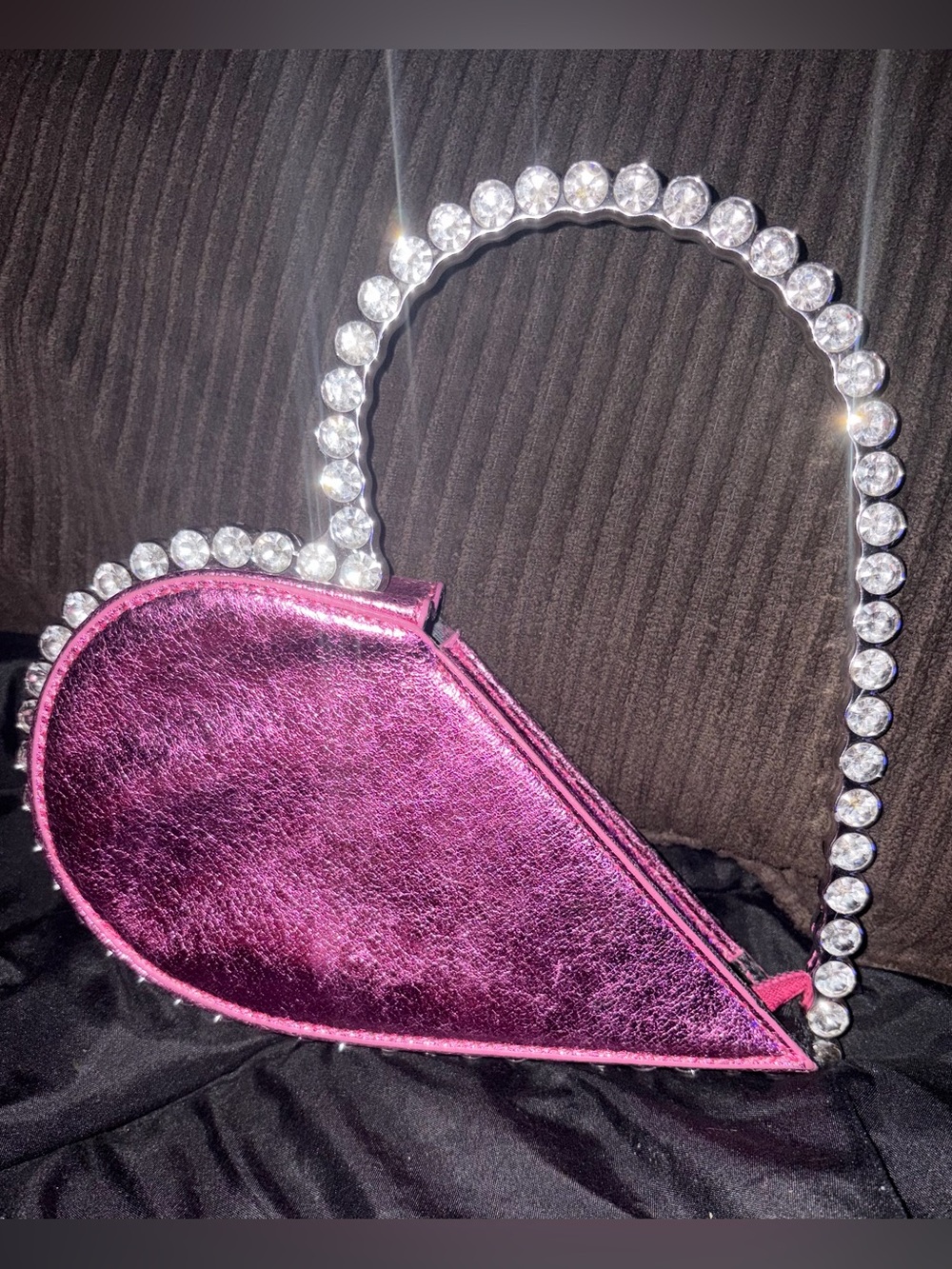 New pink rhinestone-studded heart clutch bag.
